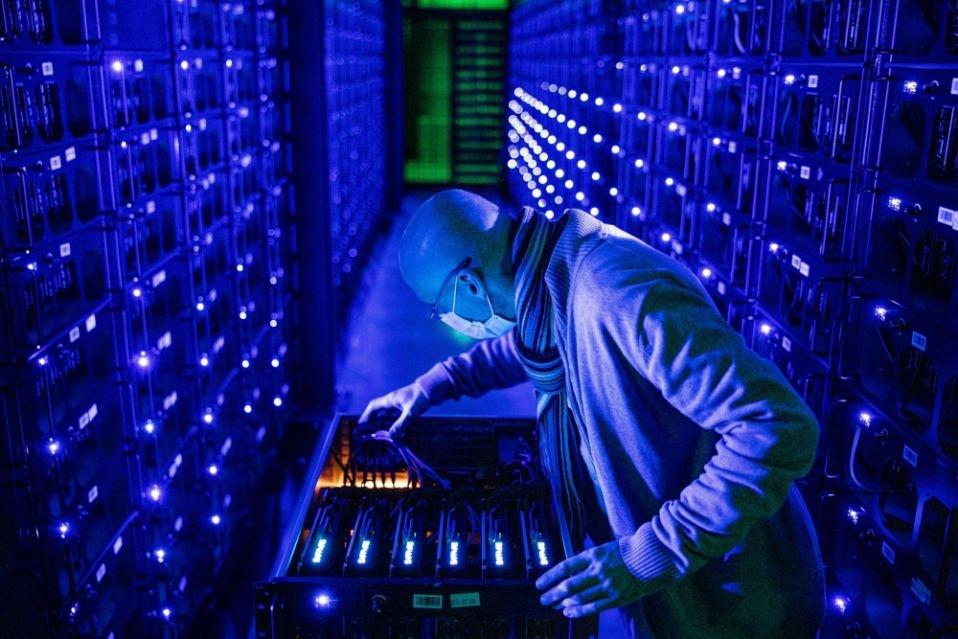 A close-up of a dedicated miner in action, symbolizing the efficiency gains from recent hardware advancements