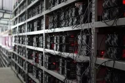 Stacked mining rigs in a professional mining farm